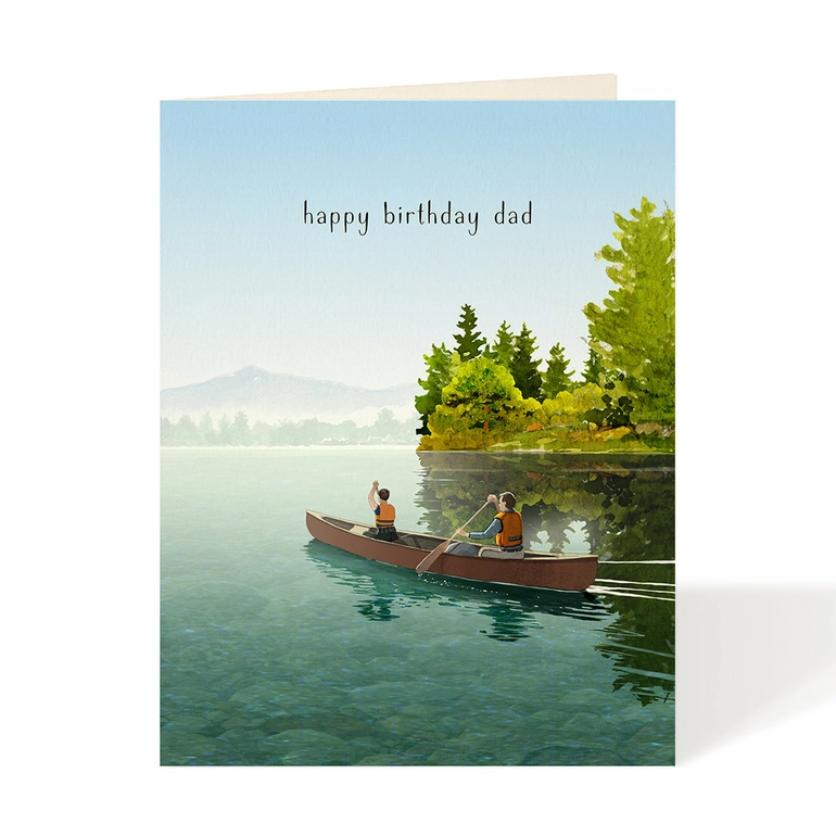 Greeting card with illustration of two people in a canoe on a lake, surrounded by trees, with 'happy birthday dad' text.