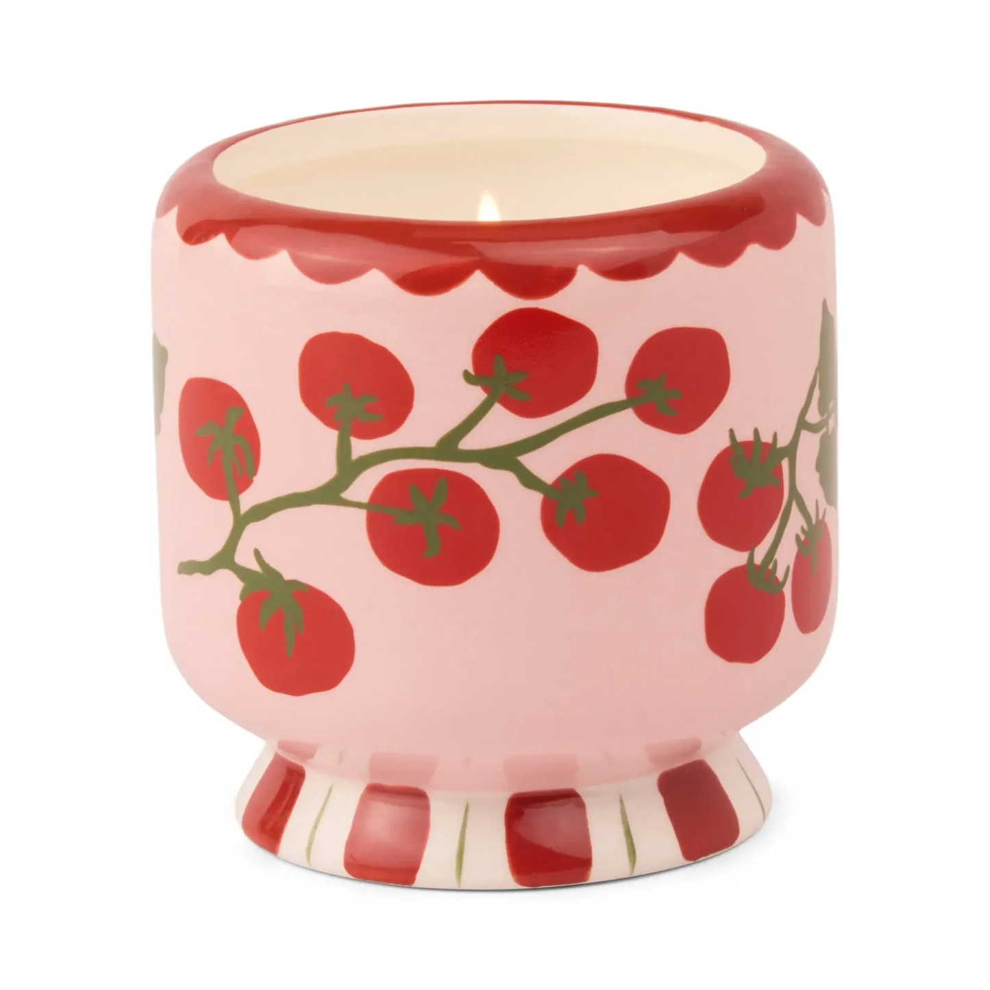 Ceramic candle container with tomato design on a white background