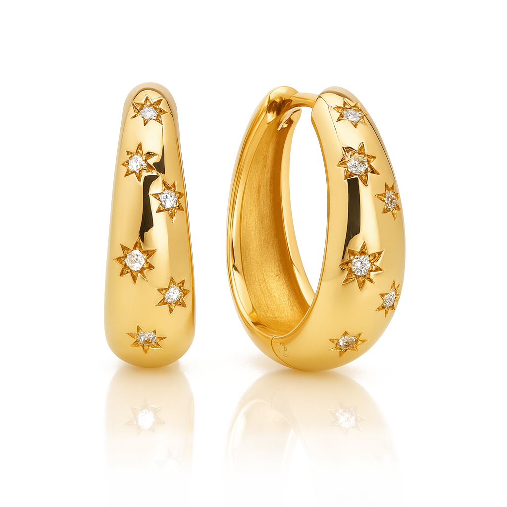 A pair of gold hoop earrings decorated with small starburst motifs set with clear gemstones, displayed on a clean white background with a soft reflection.