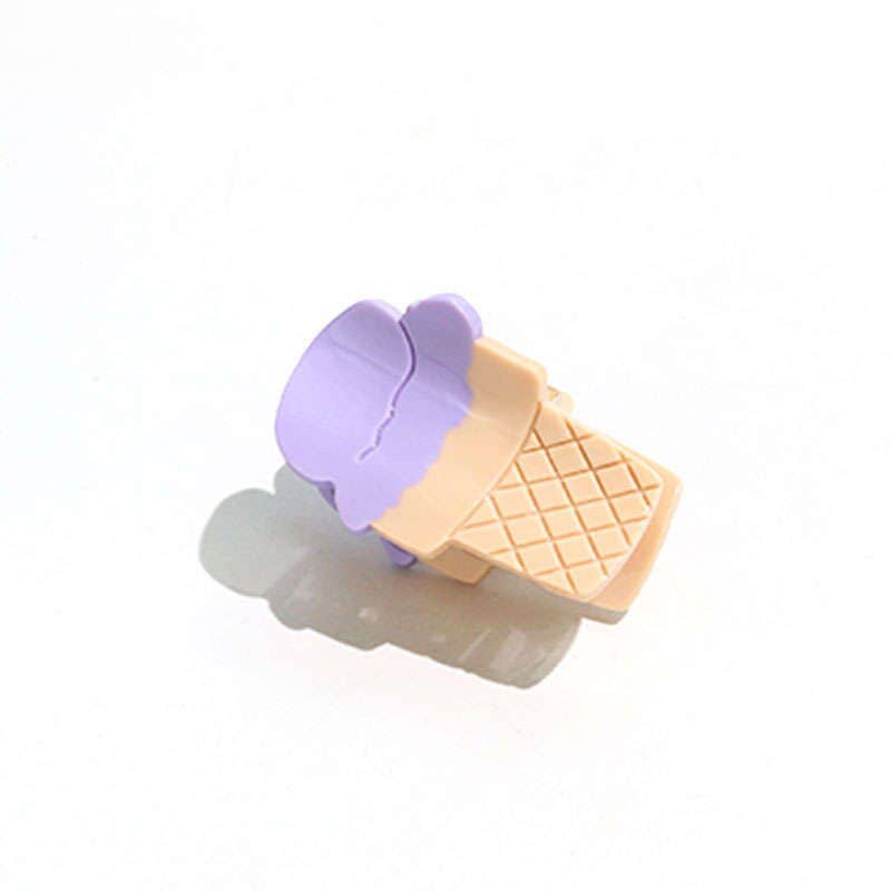Ice cream cone-shaped clip with purple top on a white background