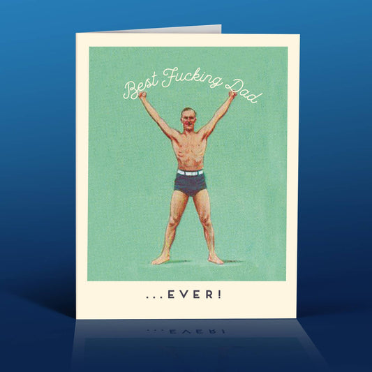 A greeting card with a humorous illustration of a man in briefs with the text 'Best Fucking Dad...EVER!' above him.