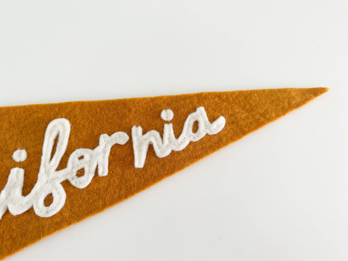 Felt pennant with 'California' text on a white background