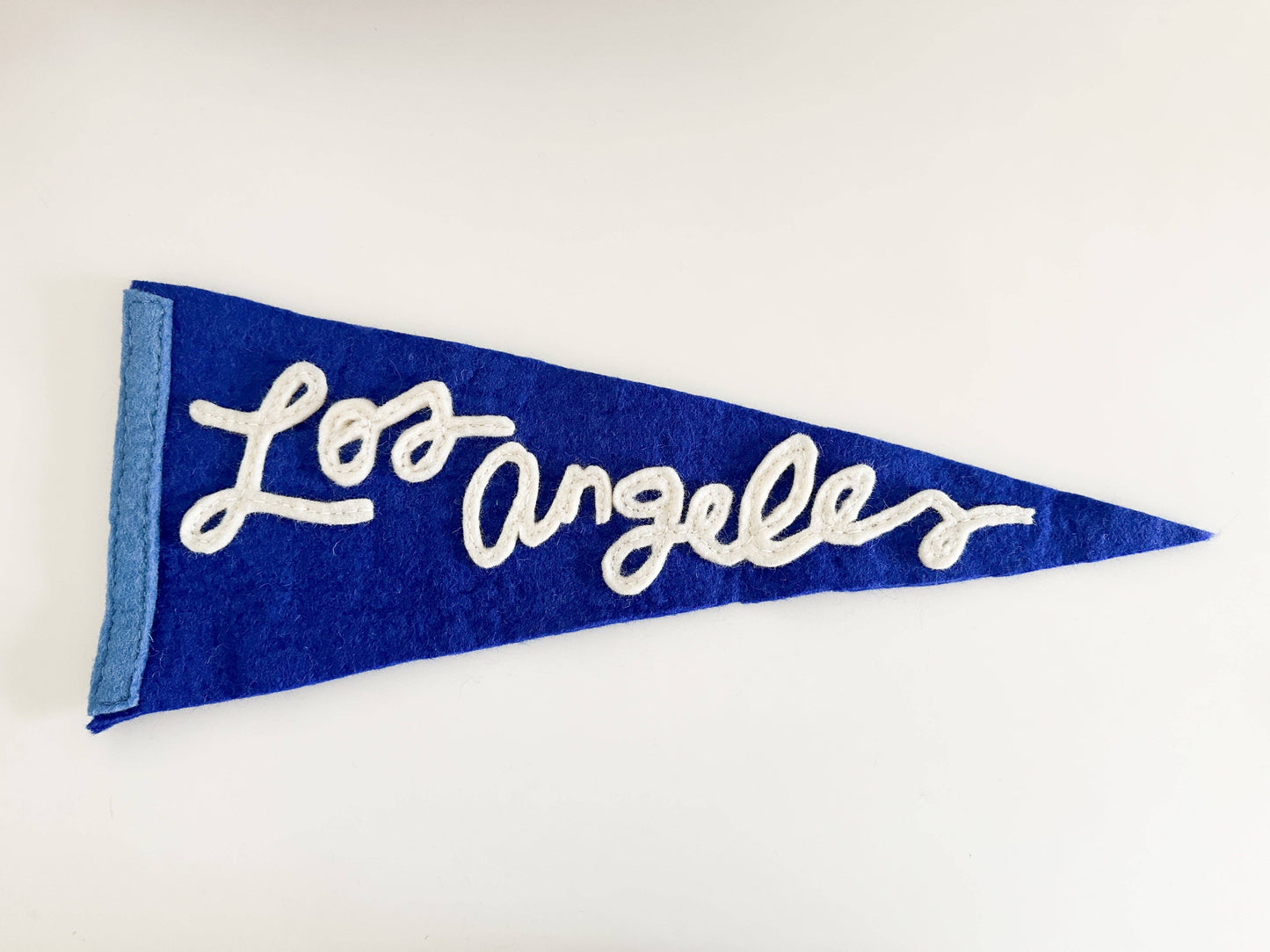 Blue pennant with 'Los Angeles' text on a white background
