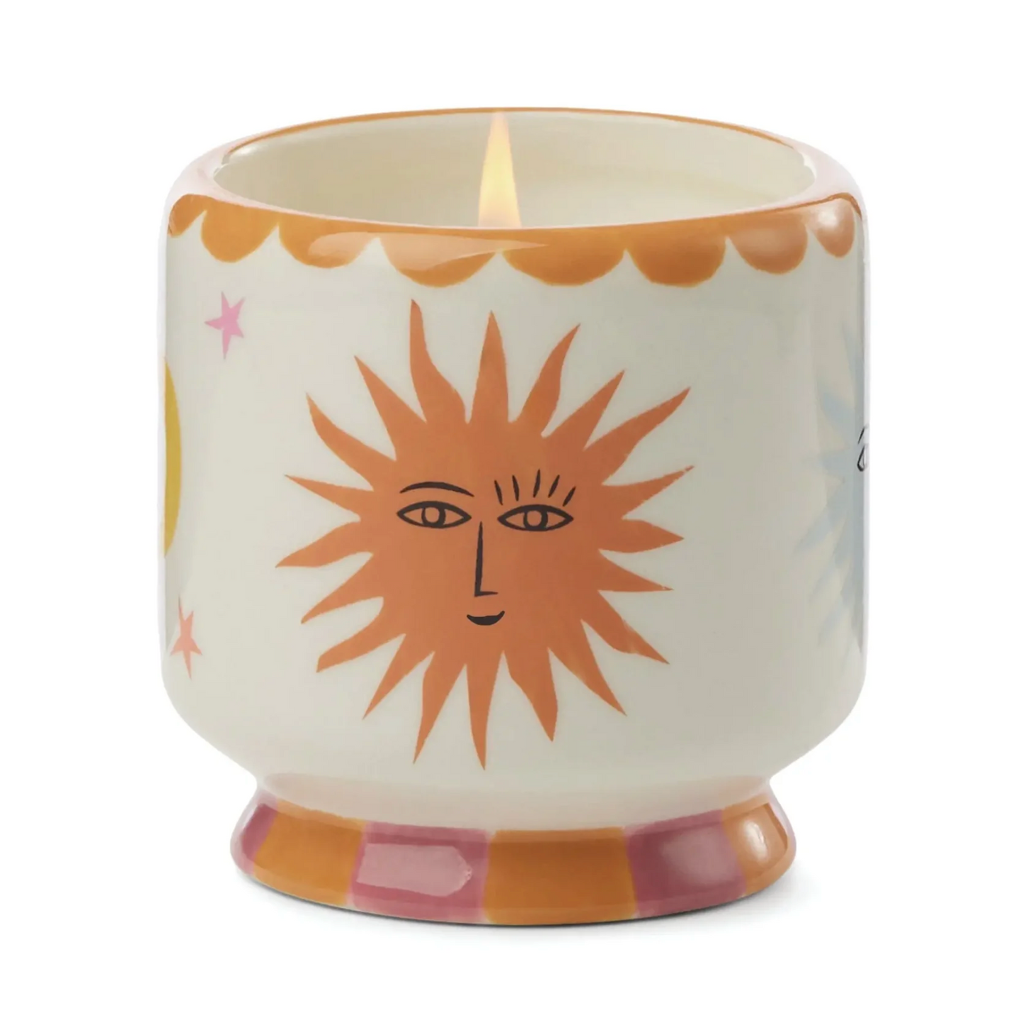 Ceramic candle with sun design on a white background