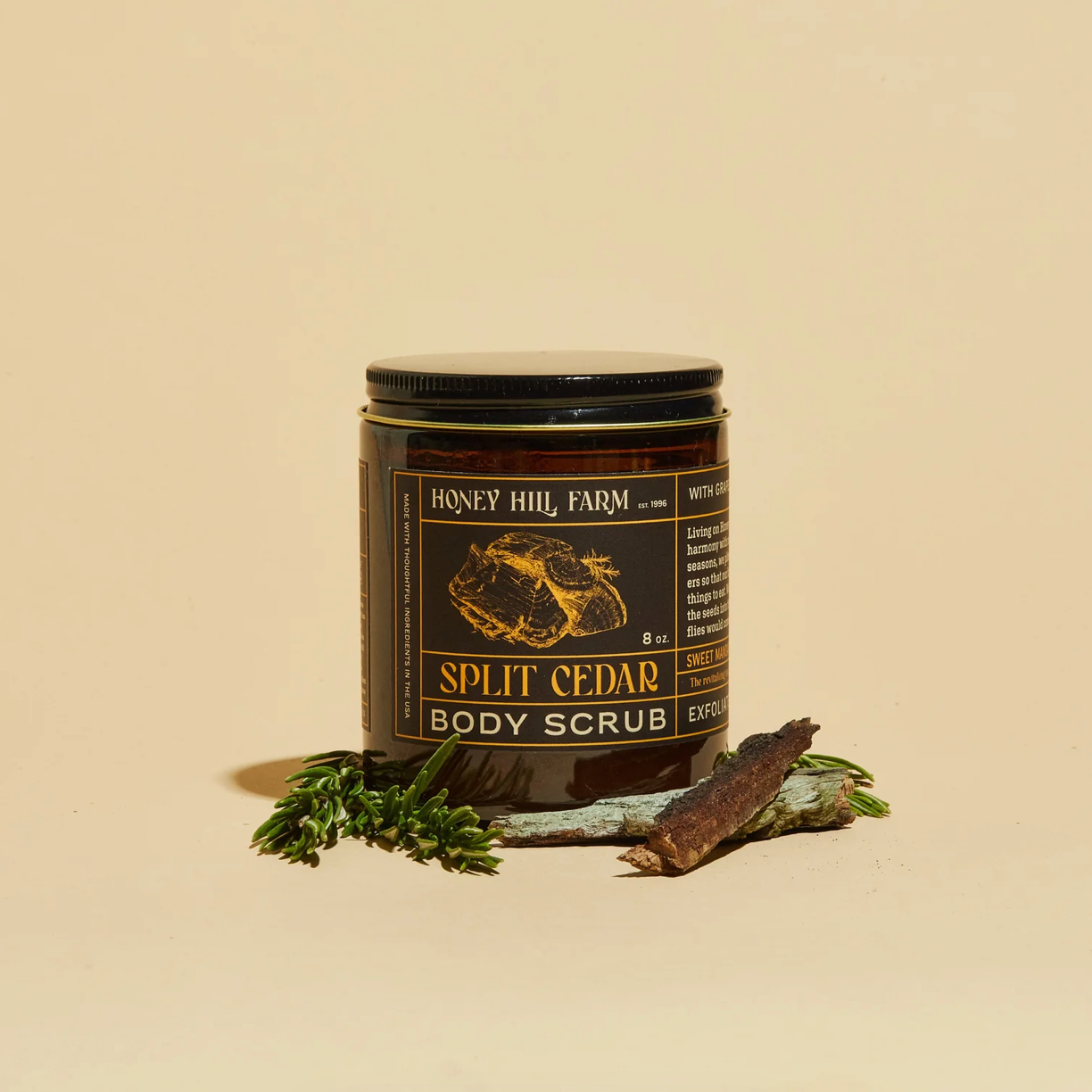 Jar of Honey Hill Farm Split Cedar Body Scrub on a beige background