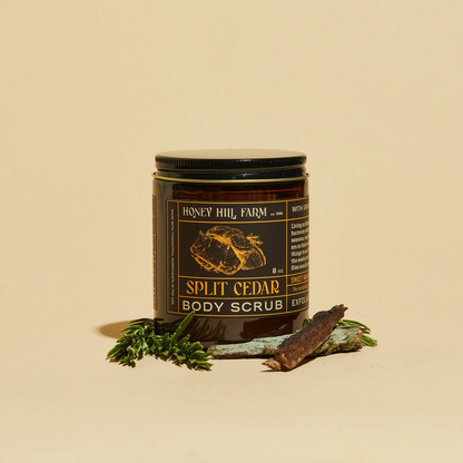 Jar of Honey Hill Farm Split Cedar Body Scrub on a beige background