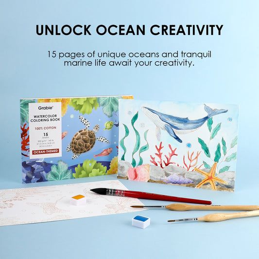 Watercolor coloring book with ocean-themed illustrations on a blue background, featuring a paintbrush and watercolor block.