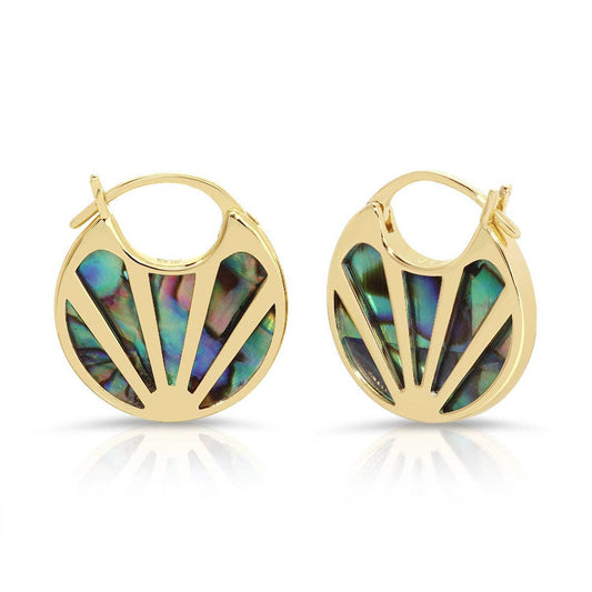 A pair of gold hoop earrings with a scalloped shell-like cutout design filled with iridescent abalone shell inlay, shown on a white background with a soft reflection.