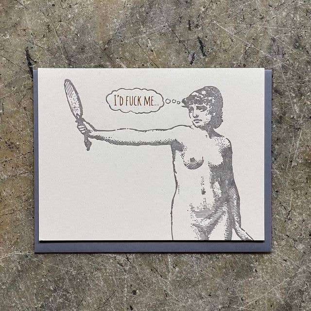 A square art print or card with a dark gray border, featuring a black-and-white illustration of a nude woman holding a mirror, with a speech bubble reading 'I'D FUCK ME'. The print is photographed flat on a textured gray surface.