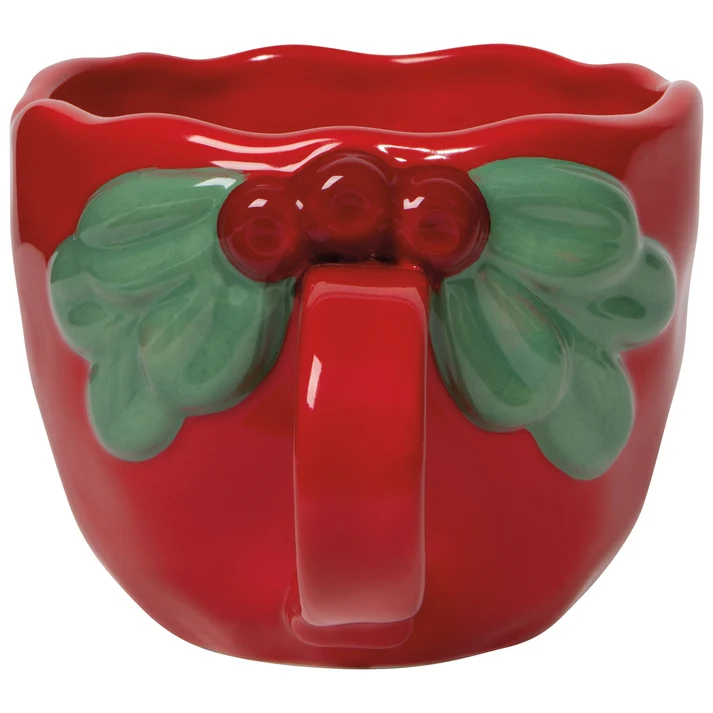 Red mug with green leaf and berries on a white background