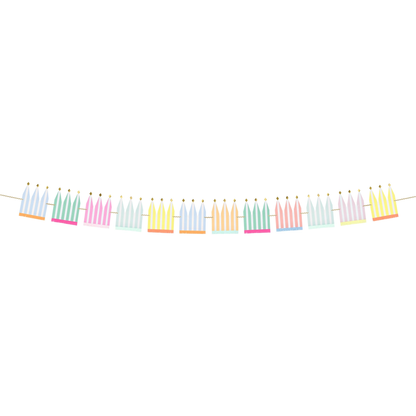 Decorative string of colorful candles on a white background