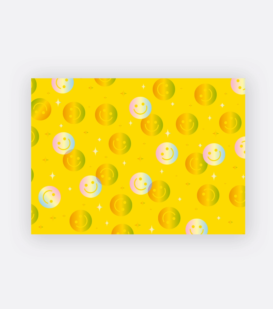 Yellow paper with metallic shimmer smile faces. Featured on a white background
