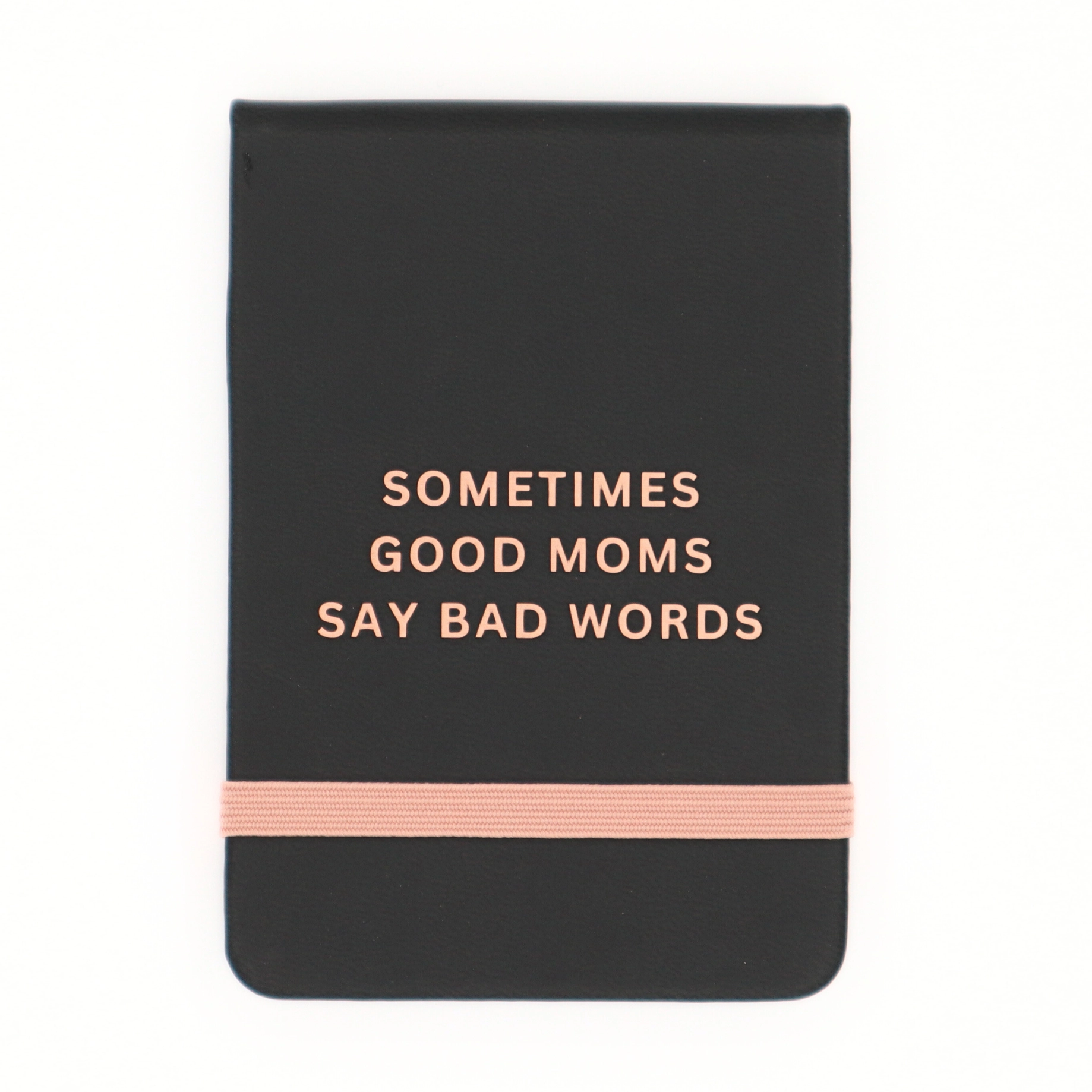 Black notebook with 'Sometimes Good Moms Say Bad Words' text and a pink band on a white background