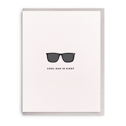 Card with sunglasses illustration and 'Cool Dad in Sight' text on a white background