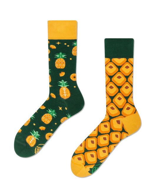 Two socks with pineapple pattern on a white background