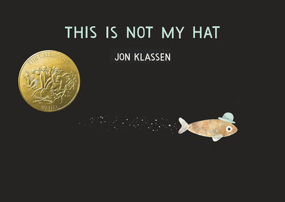 Book cover of 'This is Not My Hat' by Jon Klassen with a gold coin and fish illustration on a black background.